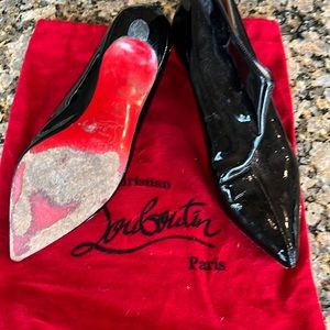 Christian Louboutin patten leather booty with a kitten heel